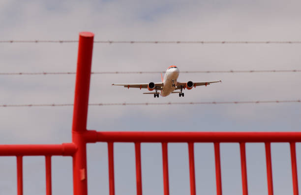 Gran Canaria, Spain - July 02 2024: A Passenger Plane approaches the landing strip in Gran Canaria airoport, the busiest of the Canary Islands