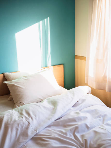 istock Bed Mattress and Pillows Bedroom with morning light 2160411486