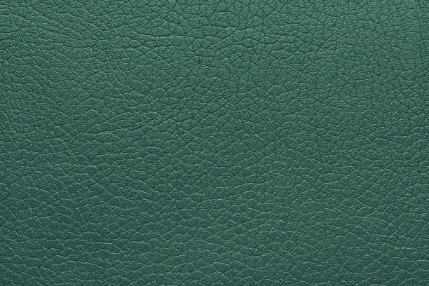 istock Natural, genuine green leather texture, structure of glossy leatherette macro background 2160412122