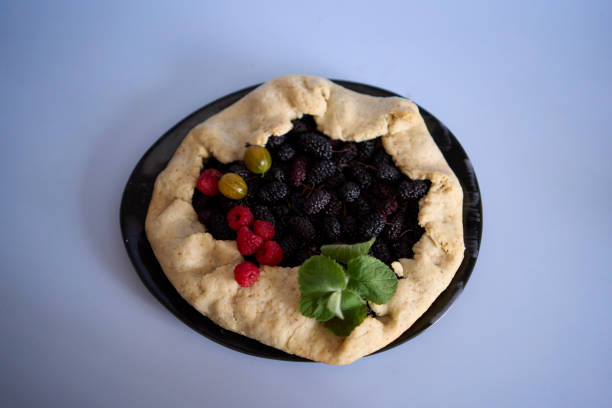 process of making galette pie with mulberry