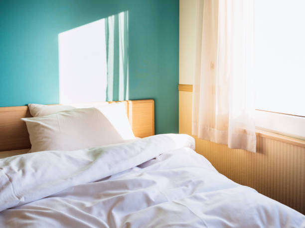 istock Bed Mattress and Pillows Bedroom with morning light 2160414046