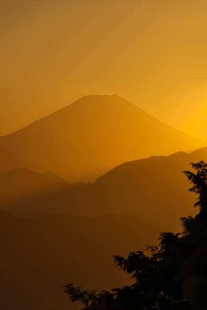 Iconic Mount Fuji  with golden sunset sky