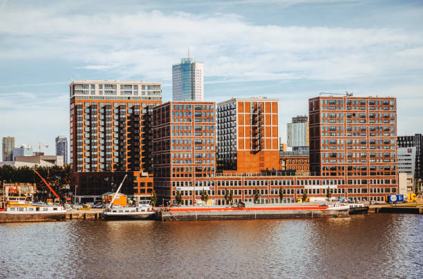 Panoramic cityscape of Philadelphia, Pennsylvania looking from the Benjamin Franklin Bridge over the Delaware River.  Penns Landing is in the left foreground,