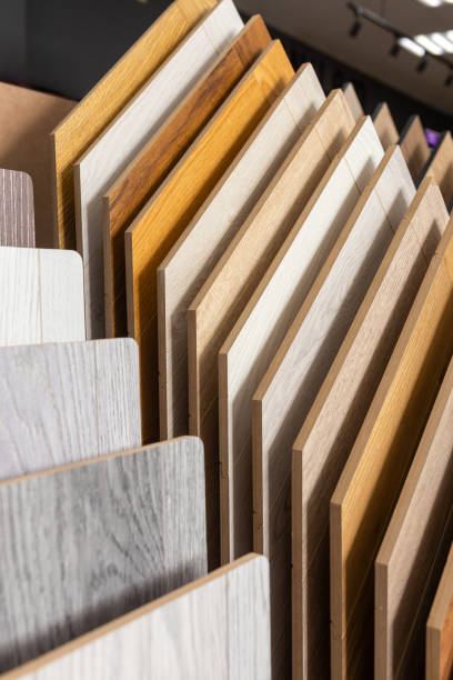 istock Samples of laminate or parquet with a pattern and wood texture for flooring 2160421279