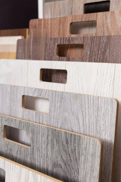 istock Samples of laminate or parquet with a pattern and wood texture for flooring 2160421539