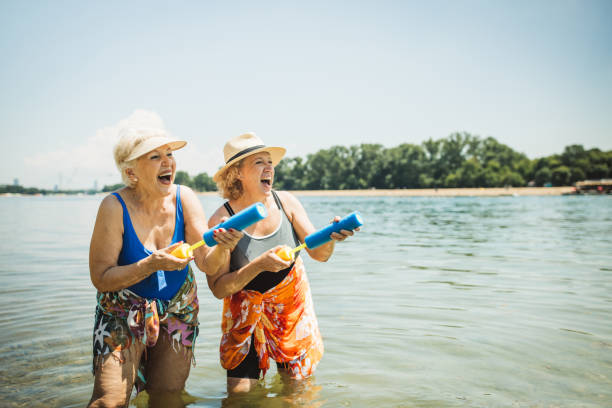 istock Happy senior woman on the beach 2160423563