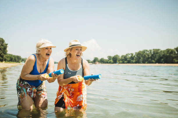 istock Happy senior woman on the beach 2160423570