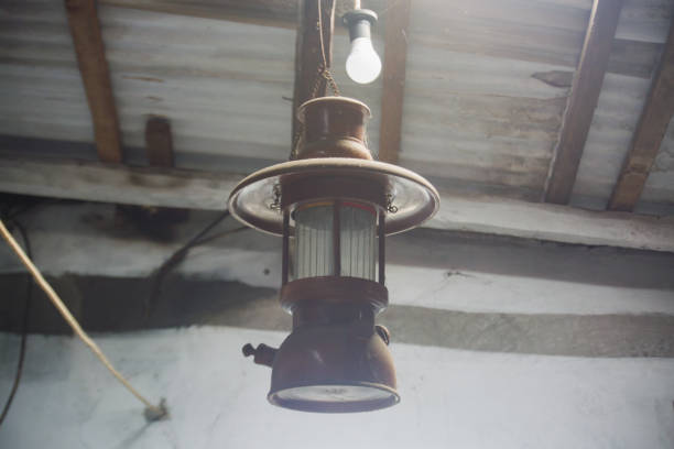 istock Retro and old fashioned antique pressed paraffin lamp 2160425265