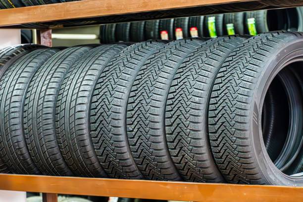 istock New Tires on a Shelf in a Store 2160427027
