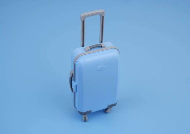 Travel and shopping concept. Shopping cart with suitcase on blue background close up.