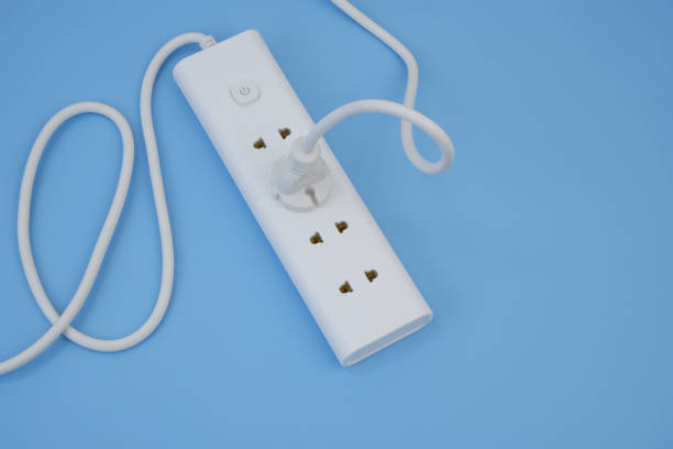 istock Electric sockets or power supply on blue background. 2160428503