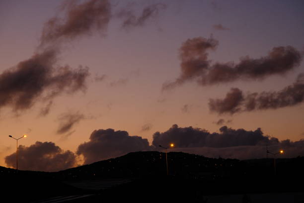 In the early hours of the morning, rain-laden clouds create a spectacular sight in the sky.
