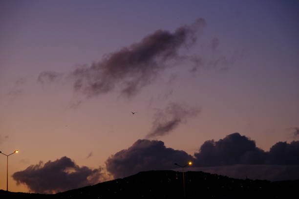 Rain clouds created a pleasant view over the city. A cloudy landscape at sunrise