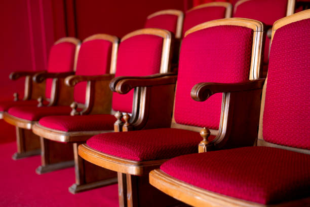 istock red empty seats for spectators in the theater or cinema close-up 2160431221