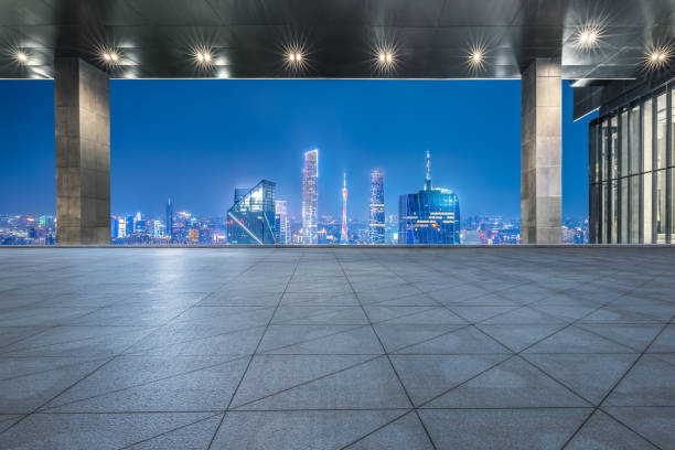 istock Empty square floor and city commercial buildings skyline 2160431348