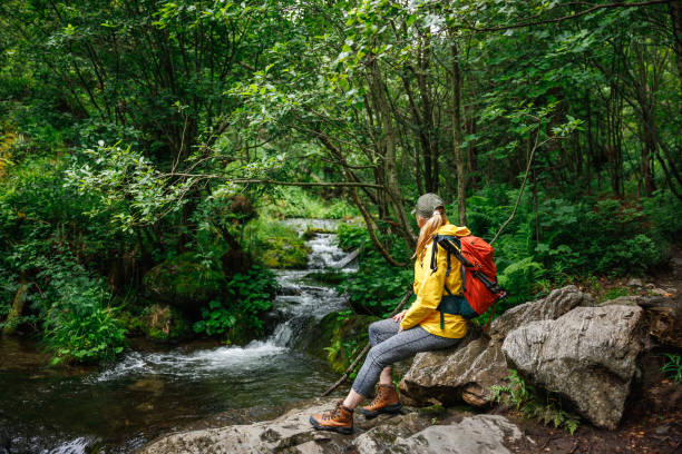 istock Woman resting during hiking in nature 2160431878