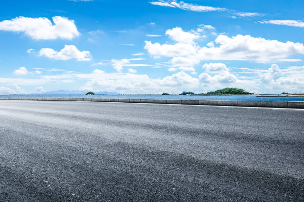 istock Empty asphalt road and sea with mountain landscape 2160432018