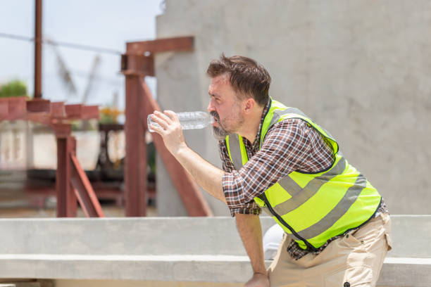 istock Caucasian engineer man drinking water at the precast factory site, Worker man drinking water at container cargo 2160434282
