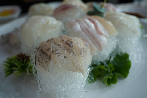 istock A table of fresh raw fish is served 2160436737