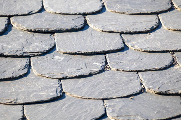 istock Slate roof tiles with overlapping arrangement and texture 2160437048