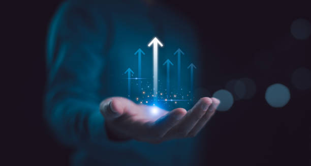 istock Hand holding growth business strategy arrow concept on success target improvement with increase development graph profit or economy investment income target and goal increase achievement. 2160443827