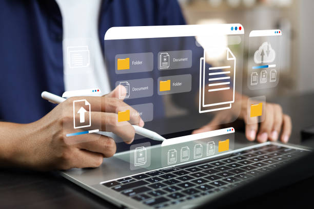 istock Document management system concept (DMS), Businessman working laptop virtual screen icons folder and document management system, Software for archiving, Searching and managing files corporate document 2160446868