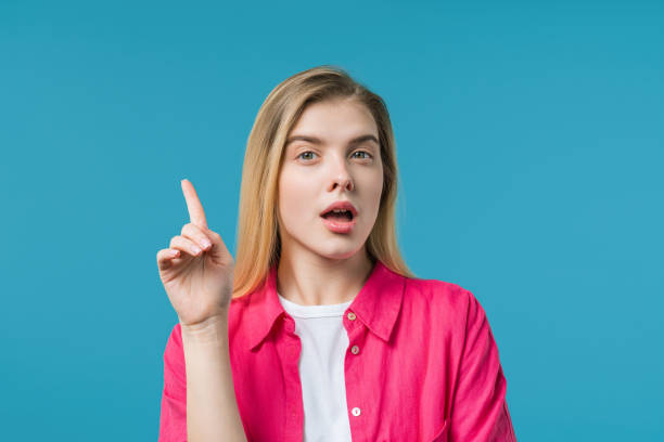 istock Genous creative idea, 20s aged woman have eureka moment, pointing finger up 2160447521