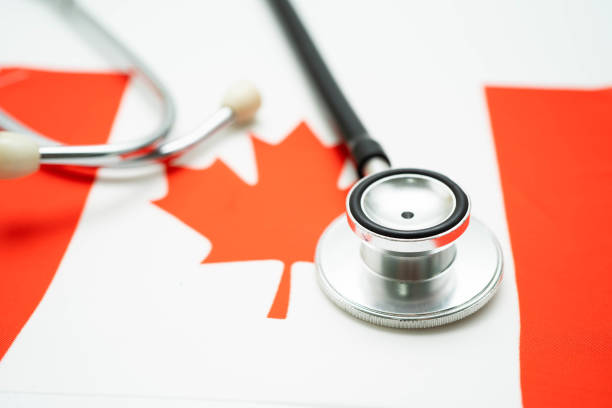 istock Stethoscope on Canada flag, Business and finance. 2160447878