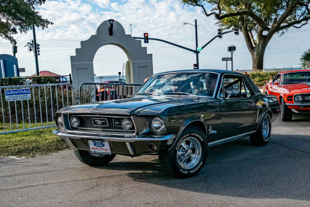 Gulfport, MS - October 02, 2023: High perspective front corner view of a 1968 Ford Mustang Hardtop Coupe at a local car show.