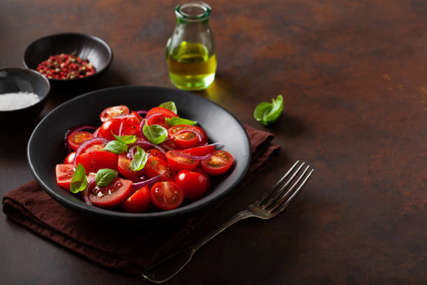 istock healthy tomato salad with onion basil olive oil and balsamic vinegar 2160453366