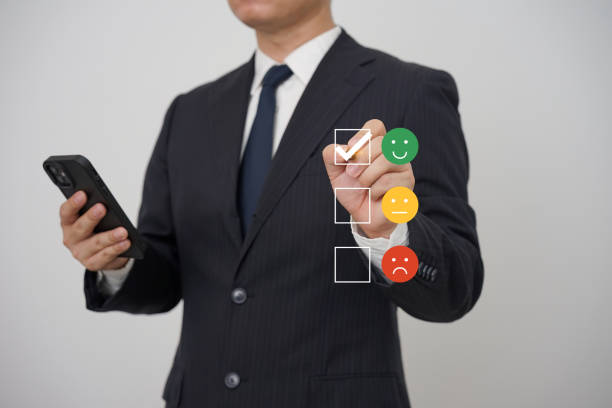 istock Professional businessman in suit touching virtual rating system, indicating a positive review. High satisfaction with a service or product concept 2160453965