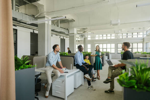 istock Coworkers brainstorming in the office 2160457511