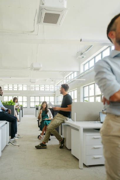 istock Coworkers brainstorming in the office 2160457535
