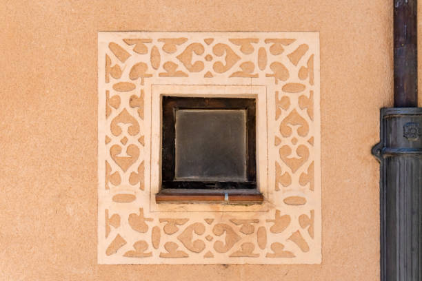 Ornate old stone window frame in Segovia, Spain