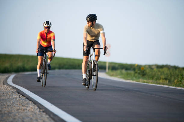 istock Couple enjoying road cycling together. 2160463805