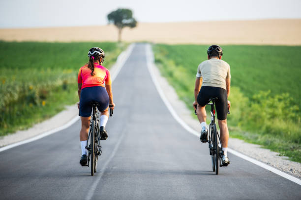 istock Athletic couple cycling as a form of exercise. 2160463808