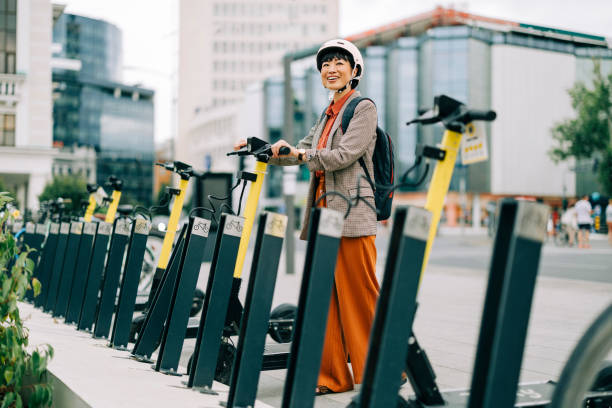 Woman renting an electric scooter