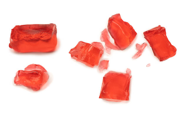 Close-Up Of Red Cake In Plate On Table