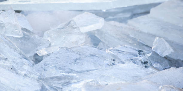 istock Frozen sea coast covered with broken ice, close up photo 2160467225