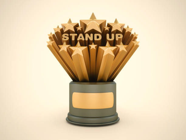 istock Gold Stars with Stand Up Word on Trophy 2160467393