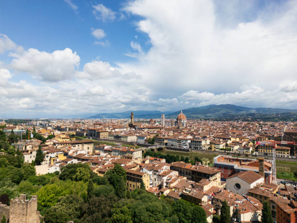 istock Florence cityscape with Duomo and Arno river on a cloudy day 2160468329