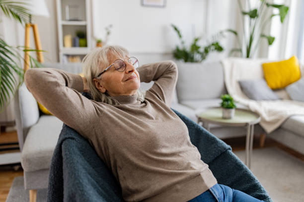 istock Elderly Woman Relaxing at Home 2160473232