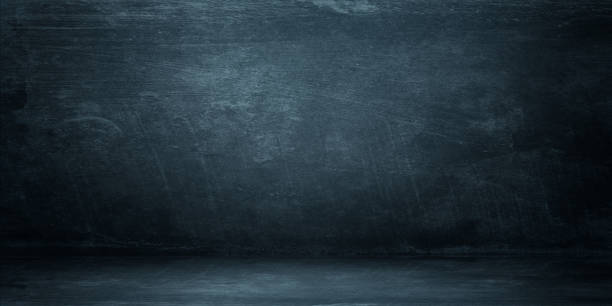 istock Dark and soft blue abstract cement wall and studio room gradient background 2160473499