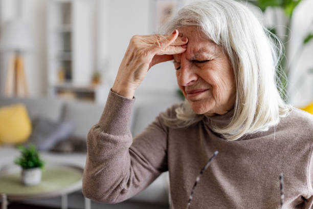 istock Elderly woman having a headache 2160474788