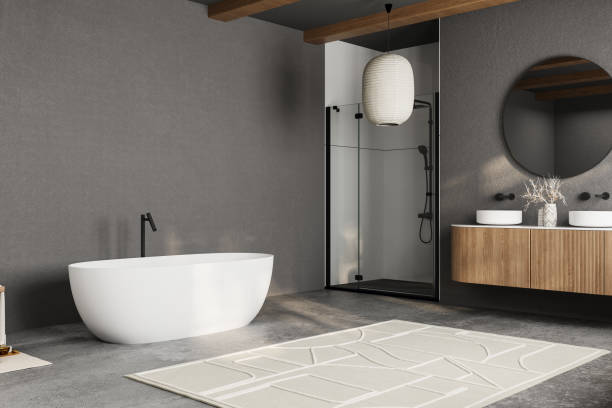 istock Modern bathroom design with a large mirror and two sinks. The mirror is surrounded by a wooden cabinet and a potted plant. The bathroom has a modern and sleek design 2160478408