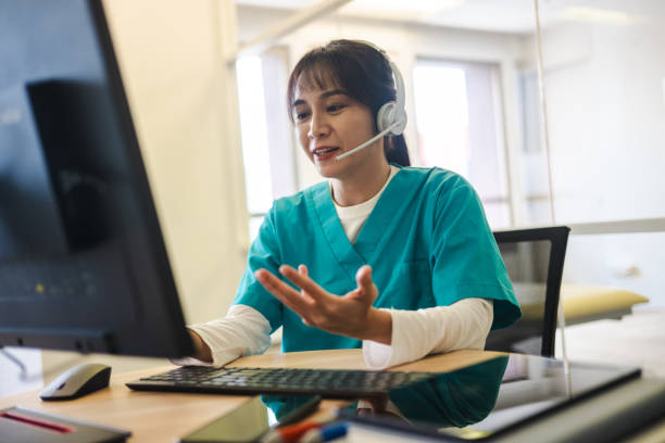 istock Modern Healthcare Interaction: Physician Consults Patient Using Advanced Communication Tools 2160478741
