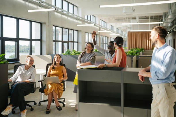 istock Group of diverse people working in a co-working office space 2160480439