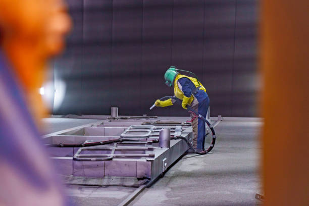 Sandblasting or abrasive blasting for steel pipes before painting and coating