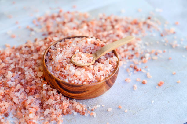 istock Himalayan Pink Salt in wooden bowl 2160482257