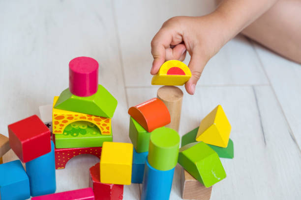 istock Wooden toys on white background 2160482807